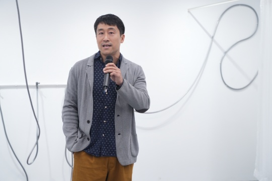 策展人  高遠先生